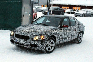 BMW тщательно скрывает новую "трешку"